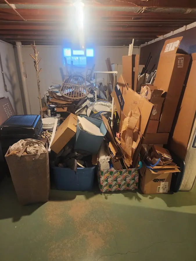 Roll-off dumpster container at job site for 4 Yard Dumpster Rental in Farmington